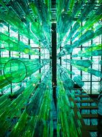 What are the key drivers of positive abnormal stock returns following a firm’s issuance of green bonds?